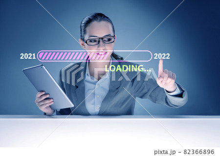 Businesswoman pressing virtual button with year 2022 Businesswoman pressing virtual button with year 2022 82366896