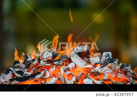 Hot sparking and flaming  live-coals burning in a barbecue 82367957