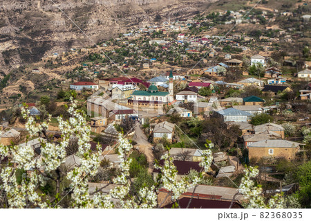 Mosque in the center of a mountain village. Landscape and countryside of cityscape in Goor. Dagestan. 82368035