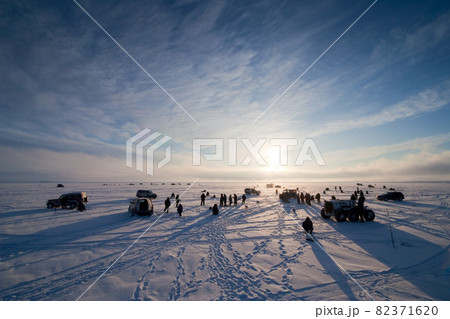 Winter ice fishing in the Arctic. 82371620