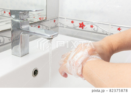 Both hands are washing their hands in the sink.Hygiene concept. Both hands are washing their hands in the sink.Hygiene concept. 82375878