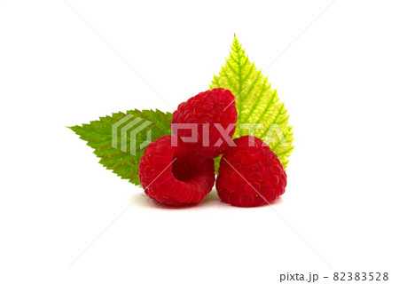Red ripe raspberry fruits isolated on white Red ripe raspberry fruits isolated on white 82383528