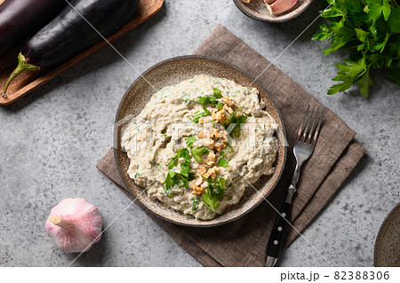 Baba ganoush Levantine cuisine appetizer from baked eggplant with parsley, garlic and olive oil. Baba ganoush Levantine cuisine appetizer from baked eggplant with parsley, garlic and olive oil. 82388306