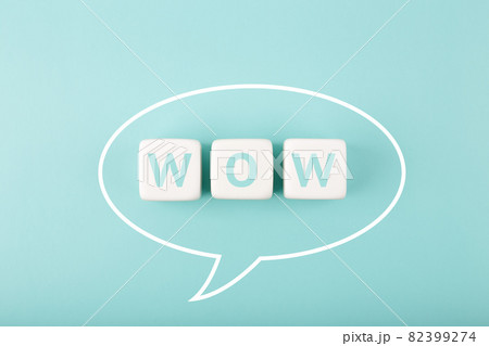 Wow speech bubble on bright blue background 82399274