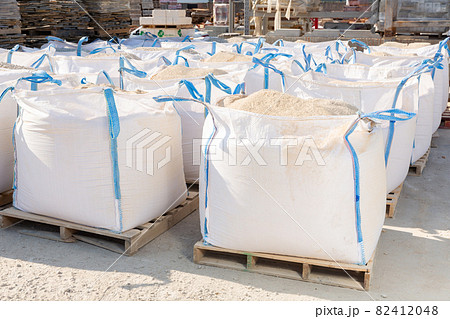 Bags of building mix at hardware store warehouse 82412048