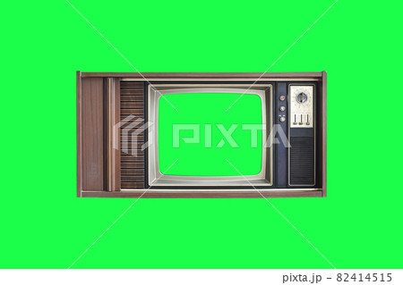 Vintage television with with green screen isolated on green background Vintage television with with green screen isolated on green background 82414515