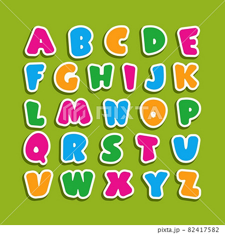 Alphabet for kids in the cartoon style. Children's font with pink, blue, yellow and green letters. Vector illustration on green background. 82417582