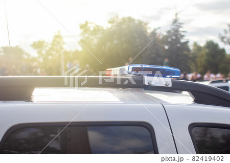 Close-up of police cars without labels or markings. A parade of cars of the defenders of order and tranquility. The work of the special services. Place for text 82419402