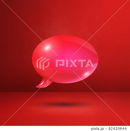 Red speech bubble on concrete wall square background 82420644