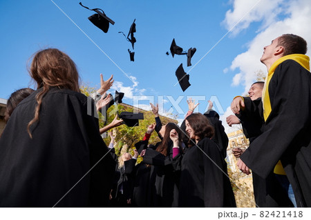 Group of diverse international graduating students celebrating Group of diverse international graduating students celebrating 82421418