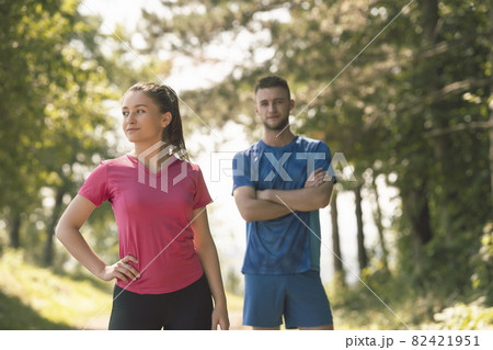 young couple preparing for a morning run young couple preparing for a morning run 82421951