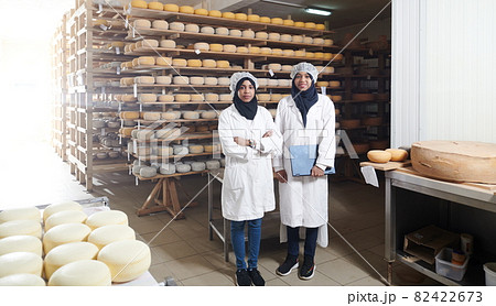 business woman team in local cheese production company 82422673