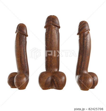 Three decorative figurines of a phallus made of wood. 3d rendering on isolated background 82425706
