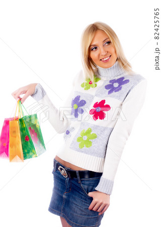 Attractive young woman with shopping bags 82425765