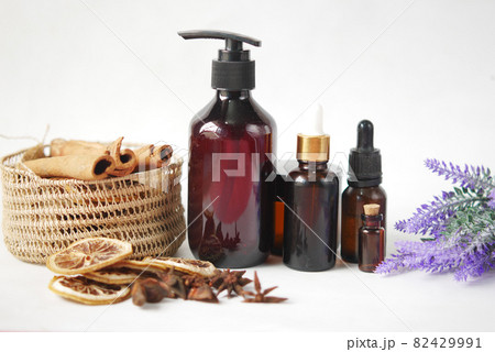 essential citrus oil, dried lemon and spice on table , essential citrus oil, dried lemon and spice on table , 82429991