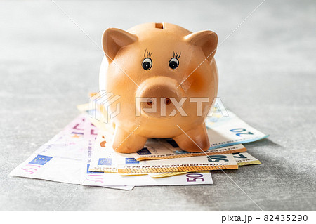 Euro banknotes and piggy bank. Savings money concept 82435290