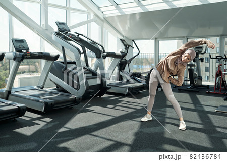 Woman Doing Stretching Exercise Woman Doing Stretching Exercise 82436784