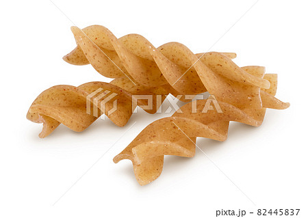 Wolegrain fusilli pasta from durum wheat isolated on white background with clipping path and full depth of field. 82445837
