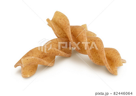 Wolegrain fusilli pasta from durum wheat isolated on white background with clipping path and full depth of field. 82446064
