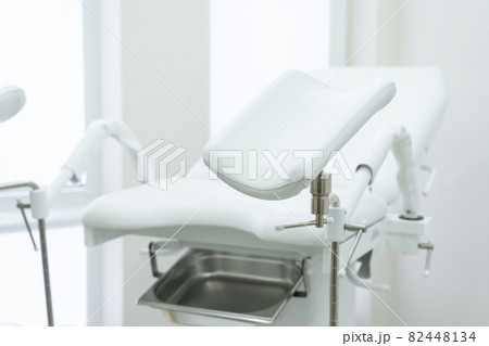 Empty white gynecological chair in modern medical center Empty white gynecological chair in modern medical center 82448134