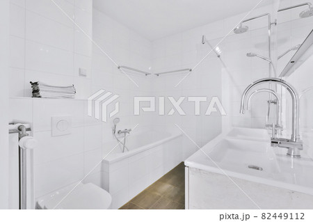 Luxury interior design of a bathroom with marble walls Luxury interior design of a bathroom with marble walls 82449112