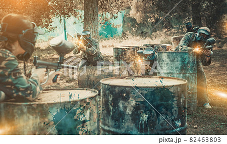enthusiastic teams facing on battlefield in outdoor paintball ar 82463803