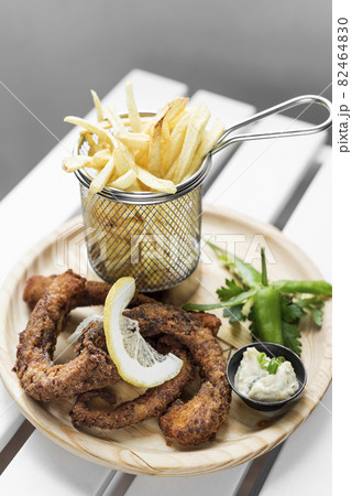 deep fried octopus tentacles and fries tapas snack in spain 82464830