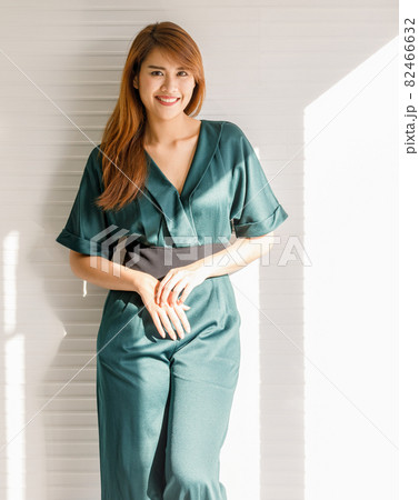 Portrait of young and cute Asain girl with long hair pose in friendly and confident gesture 82466632