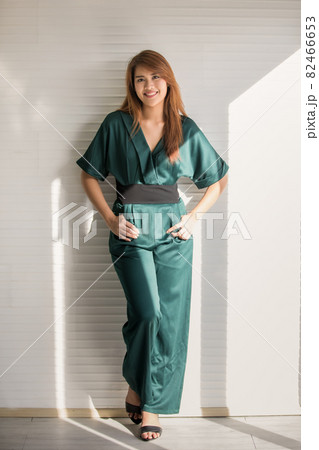 Portrait of young and cute Asain girl with long hair pose in friendly and confident gesture 82466653