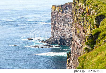These majestic high cliffs are in Latrabjarg promontory, westernmost point in Iceland These majestic high cliffs are in Latrabjarg promontory, westernmost point in Iceland 82469859