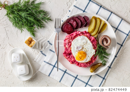 labskaus, mashed potatoes with the beet, fried egg labskaus, mashed potatoes with the beet, fried egg 82474449