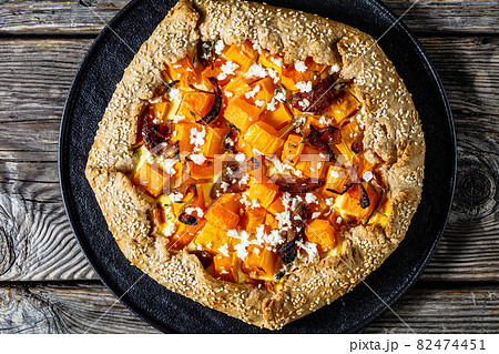 pumpkin galette with onion and feta cheese 82474451