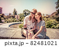 Happy family mother and her adorable little daughter on summer vacation taking selfie with smartphone 82481021