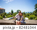 Happy family mother and her adorable little daughter on summer vacation taking selfie with smartphone 82481044