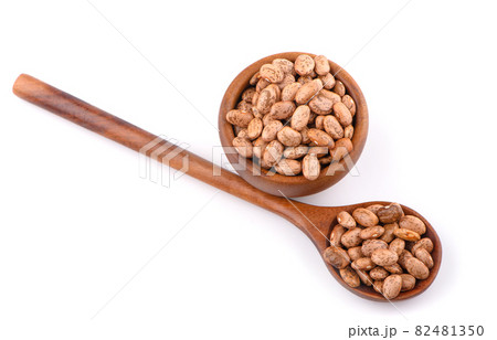 Pile of pinto beans isolated on white background 82481350