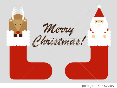 サンタクロースとトナカイがブーツに入っているイラストのイラスト素材 4785
