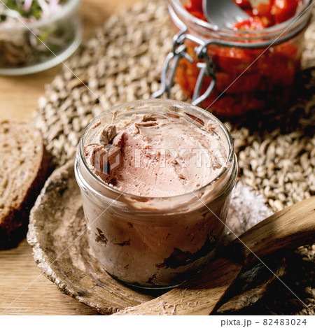 Glass jar of homemade chicken liver pate Glass jar of homemade chicken liver pate 82483024