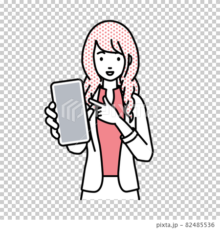 立ってスマートフォンを指差してこちらに向けて見せているジャケットの女性 82485536