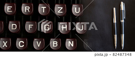 black luxury pen and button of type writer media business banner  background 82487348