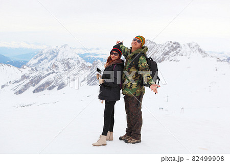 Snow covered mountain peak winter and tourist Snow covered mountain peak winter and tourist 82499908