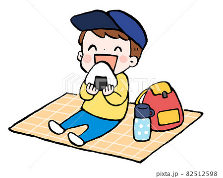 おにぎりを美味しそうに食べる男の子のイラストのイラスト素材