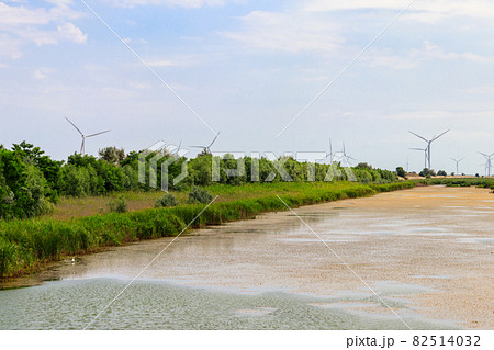 View of wind turbines and North Crimean Canal in Kherson region, Ukraine. Wind power station. Renewable energy 82514032