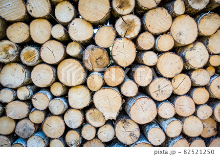 Stack of tree trunks. Texture background Stack of tree trunks. Texture background 82521250