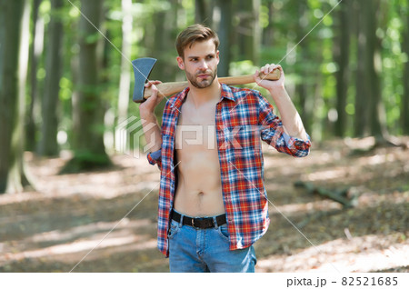 Lumbersexual trend. Bearded man carry axe natural landscape.  82521685