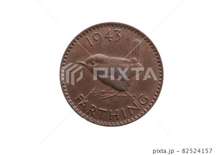 Old pre decimal 1943 George VI farthing coin of England UK reverse Wren cut out and isolated 82524157