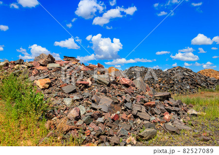 Large heap of stones near the iron ore quarry Large heap of stones near the iron ore quarry 82527089