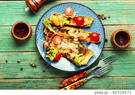 Grilled zucchini with broccoli and quinoa. Grilled zucchini with broccoli and quinoa. 82528571