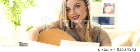 Acoustic Guitar Playing Hobby Workshop at Home 82534542