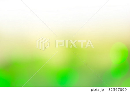 Defocused green lights background. Green glitter bokeh background. Defocused green lights background. Green glitter bokeh background. 82547099