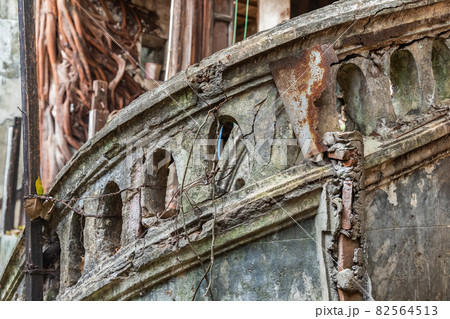 Antique stone stairs among the ruins in ancient house. Antique stone stairs among the ruins in ancient house. 82564513